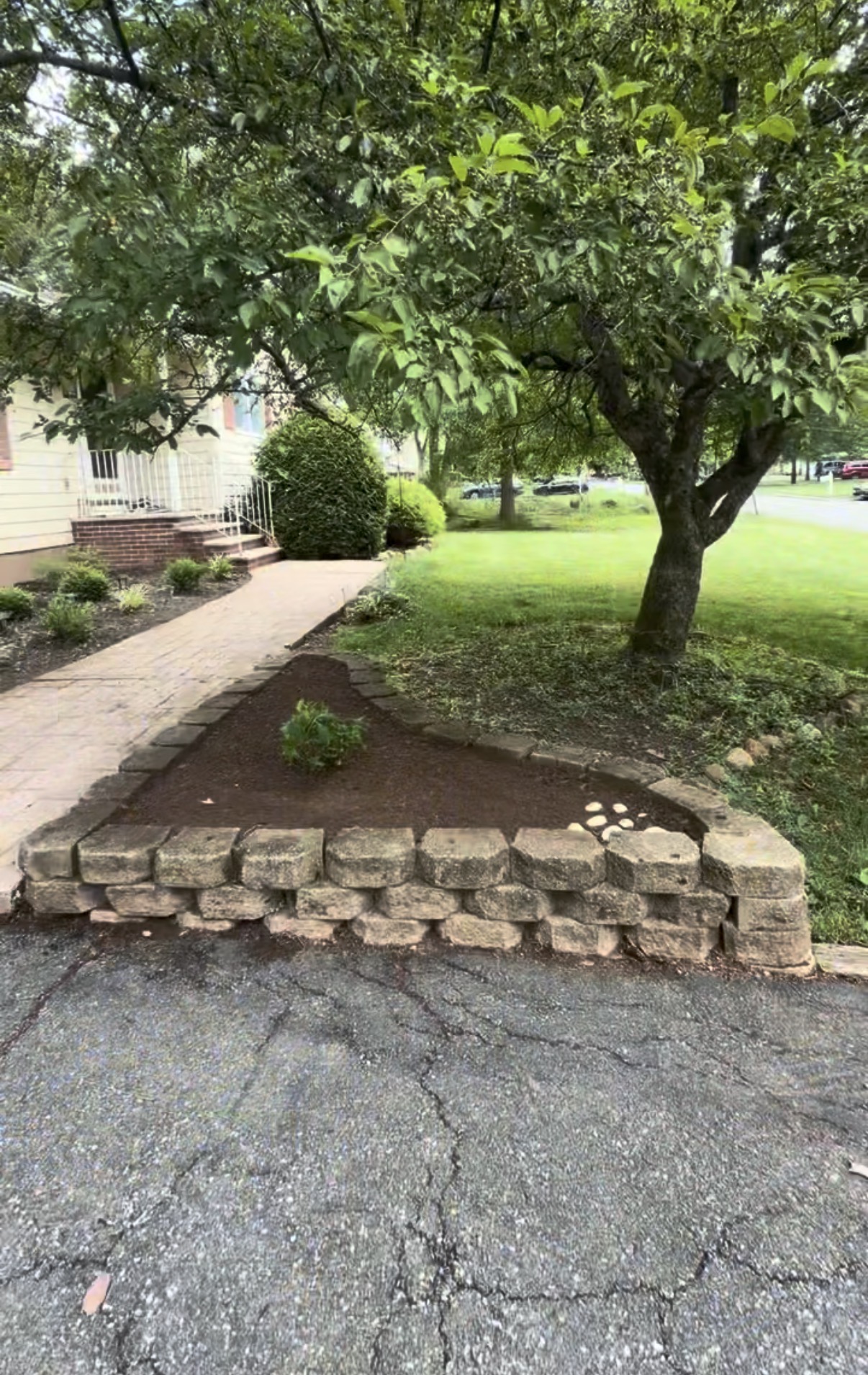 Fresh mulch and landscaping bed work completed by TR Terrain Works LLC